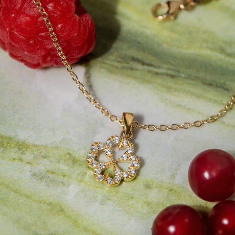 Clover pendant on 18K gold chain
