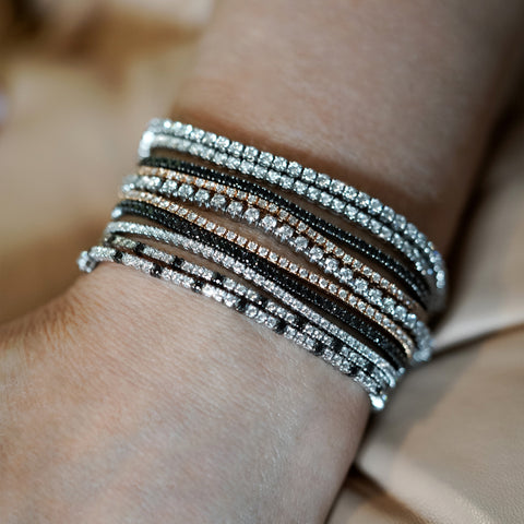 Tennis bracelet with 1.50ct black diamonds in 18K gold