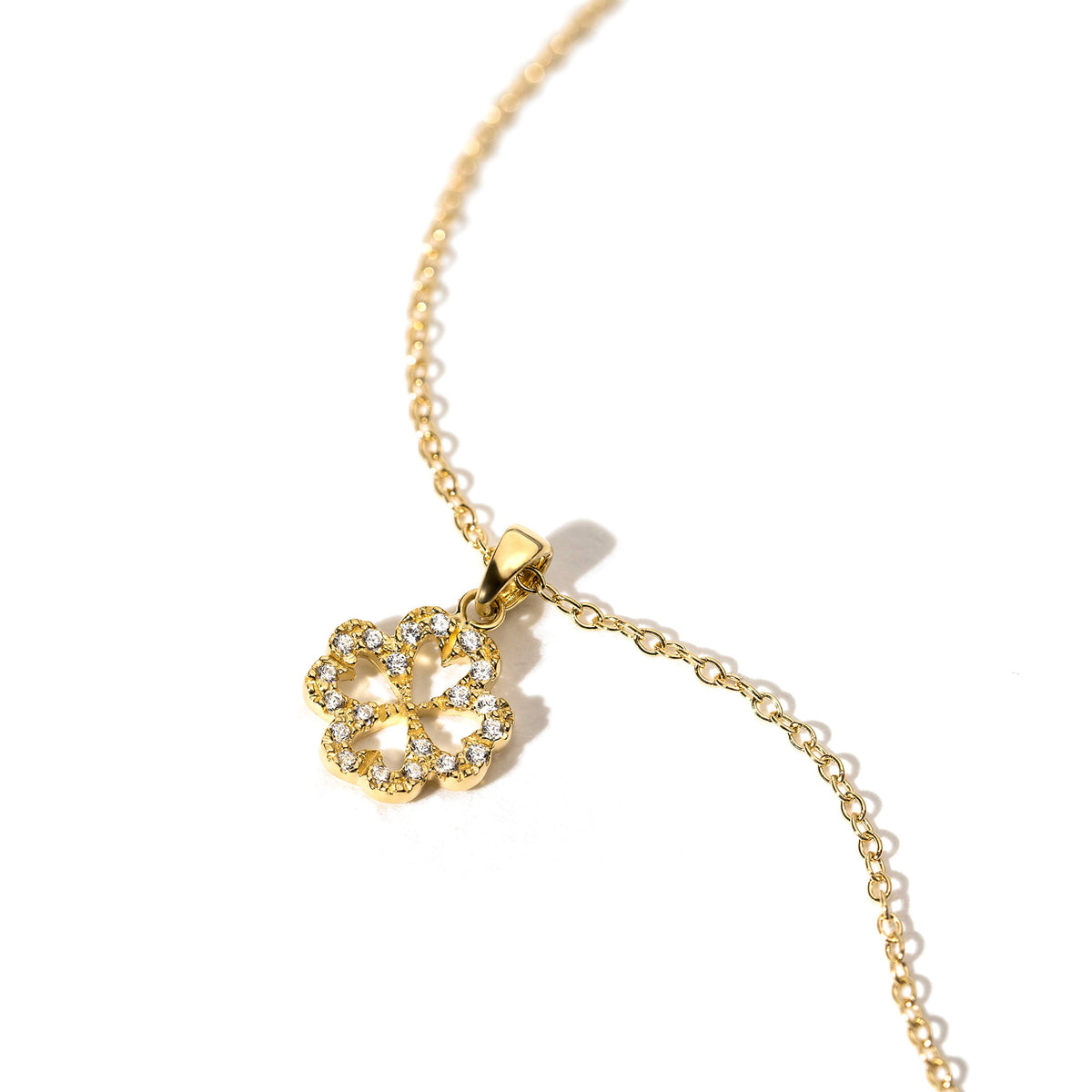 Clover pendant on 18K gold chain